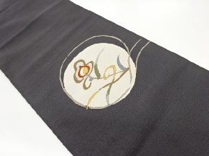 丸に抽象草花模様織出し名古屋帯